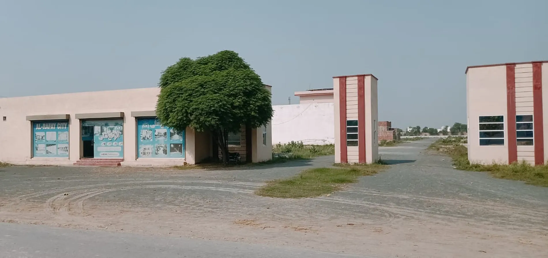 Al-Rafay City main gate and head office, Okara–Noorshah Road
