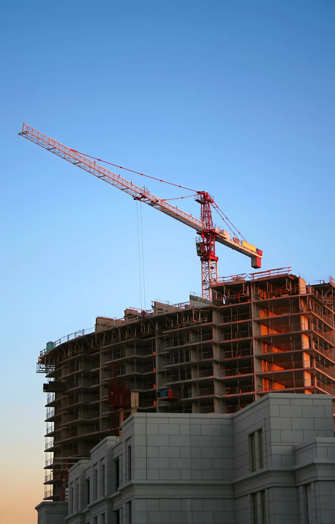 Tower crane over a building under construction