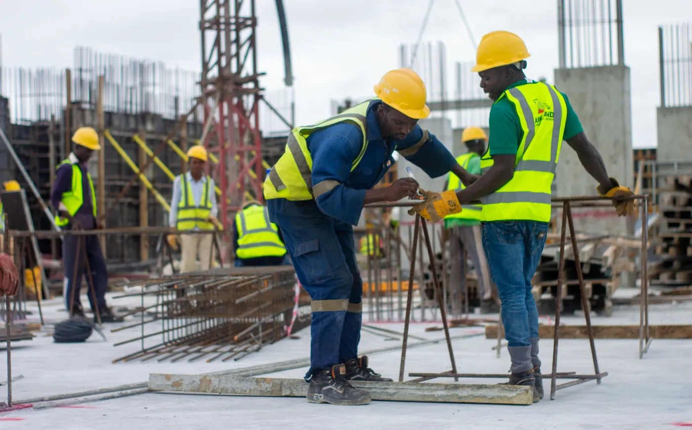 Construction team at work on a reinforced-concrete site